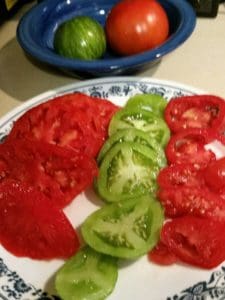 plate of sliced tomatoes